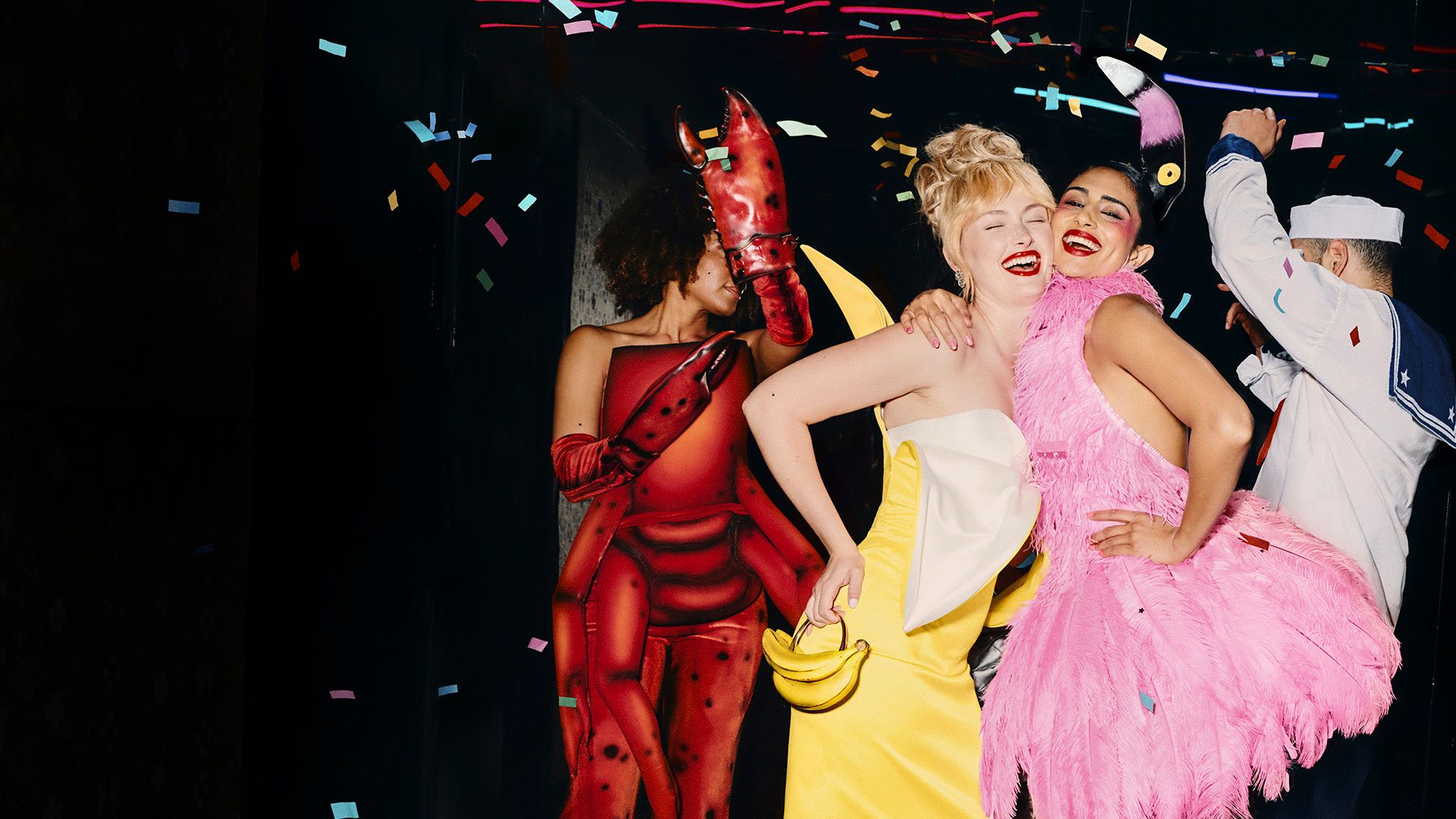 Costumed people dancing at a lively party