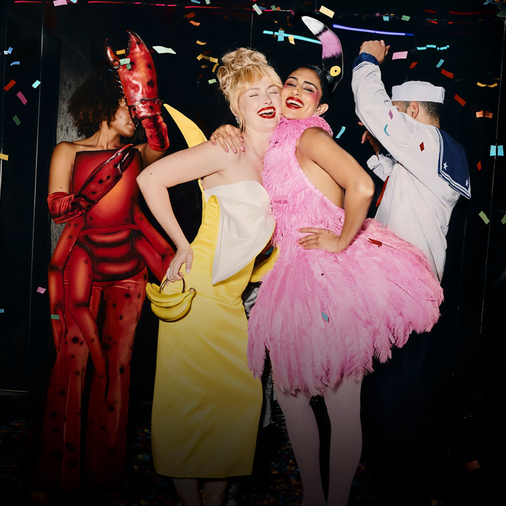 Costumed people dancing at a lively party